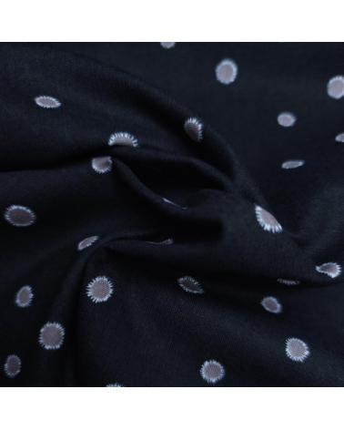 Japanese cotton-linen fabric with irregular polka dots over black background