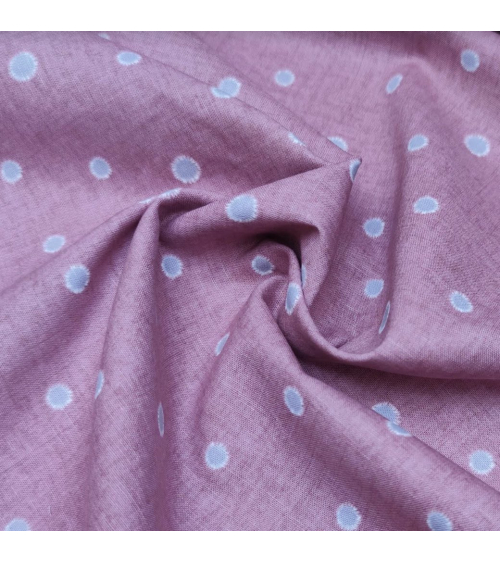 Japanese cotton-linen fabric with irregular polka dots over mauve background