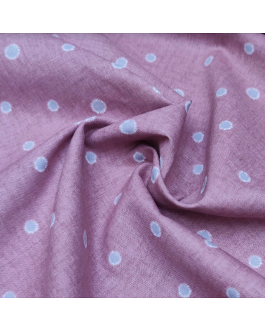 Japanese cotton-linen fabric with irregular polka dots over mauve background
