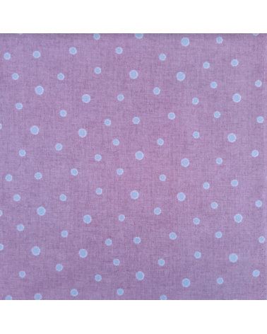 Japanese cotton-linen fabric with irregular polka dots over mauve background