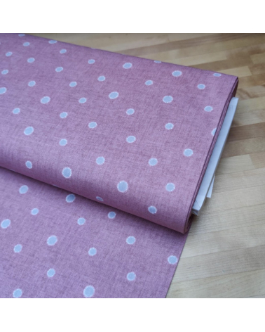 Japanese cotton-linen fabric with irregular polka dots over mauve background