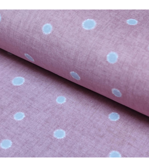 Japanese cotton-linen fabric with irregular polka dots over mauve background