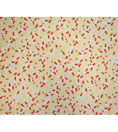 Papel japonés chiyogami de carpas rojas sobre fondo amarillo