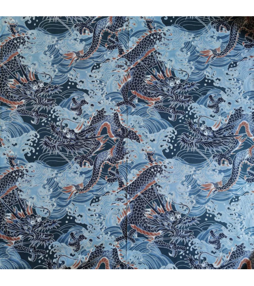 Tela dobby japonés "Dragones XL" en azul.