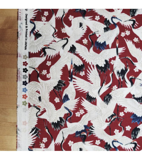 Tela dobby japonés "Tsuru to sakura" en rojo profundo.