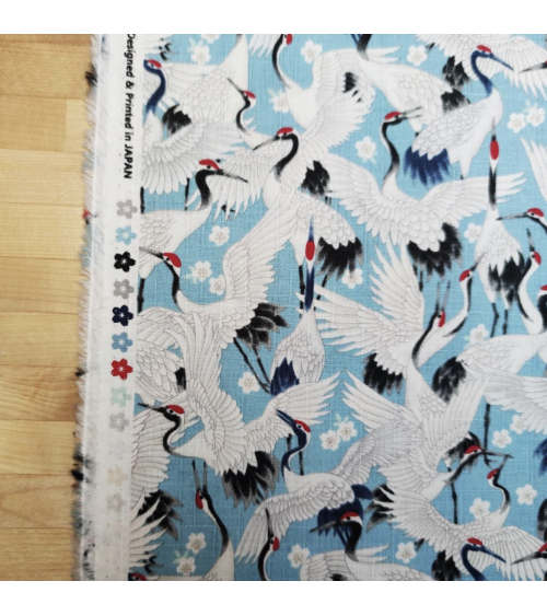 Tela dobby japonés "Tsuru to sakura" en azul claro.