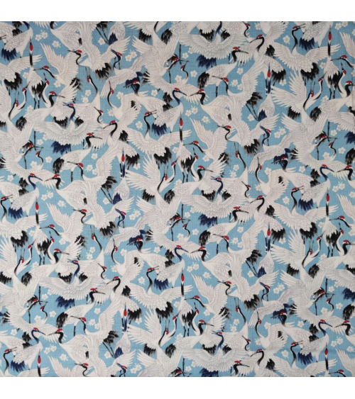 Tela dobby japonés "Tsuru to sakura" en azul claro.