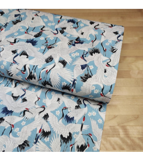 Tela dobby japonés "Tsuru to sakura" en azul claro.