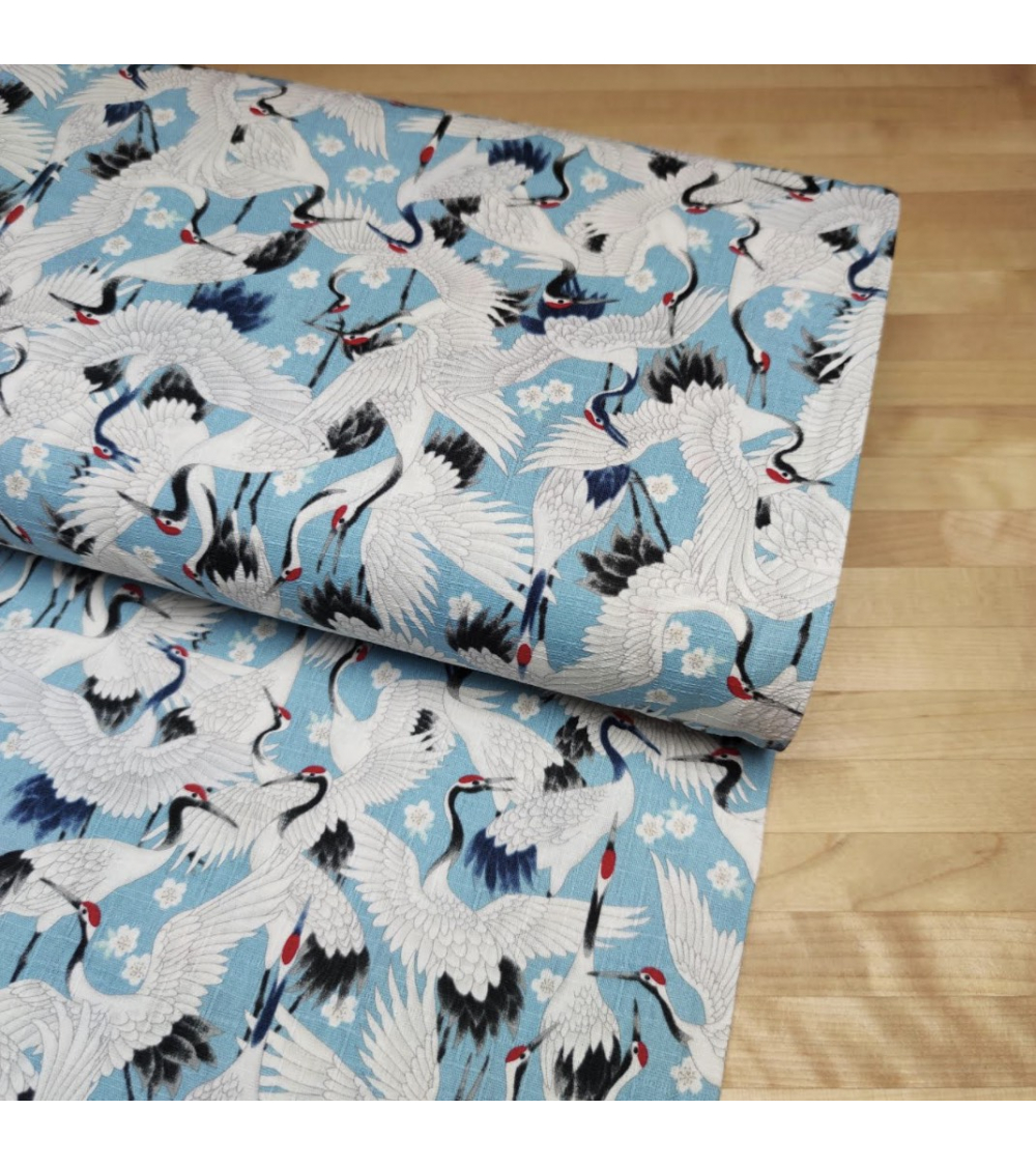 Tela dobby japonés "Tsuru to sakura" en azul claro.