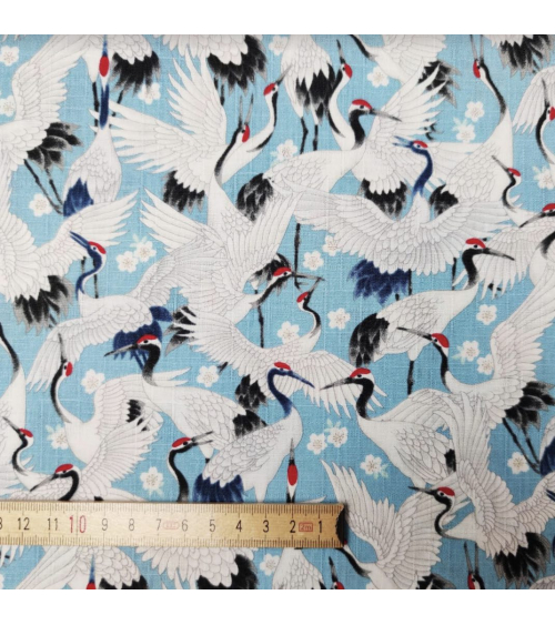 Tela dobby japonés "Tsuru to sakura" en azul claro.