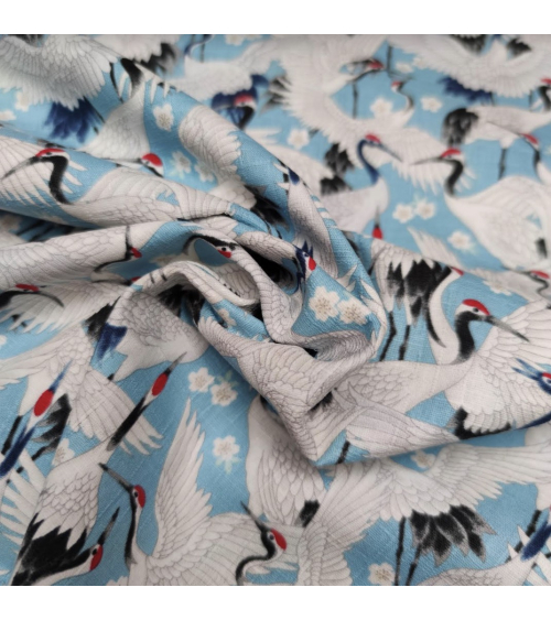 Tela dobby japonés "Tsuru to sakura" en azul claro.