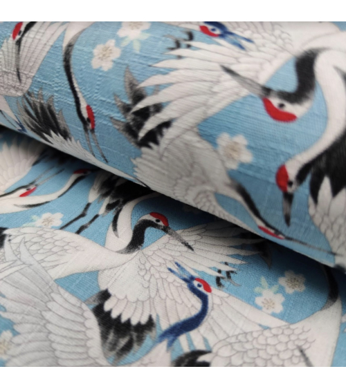 Tela dobby japonés "Tsuru to sakura" en azul claro.