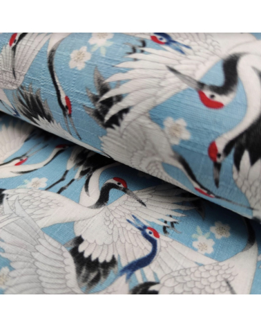 Tela dobby japonés "Tsuru to sakura" en azul claro.