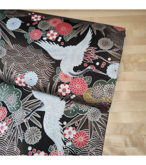Japanese fabric of cranes in brown and black with silver details.