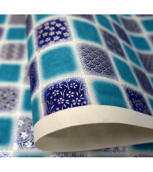 Papel japonés Chiyogami cuadrados con motivos tradicionales sobre fondo azul