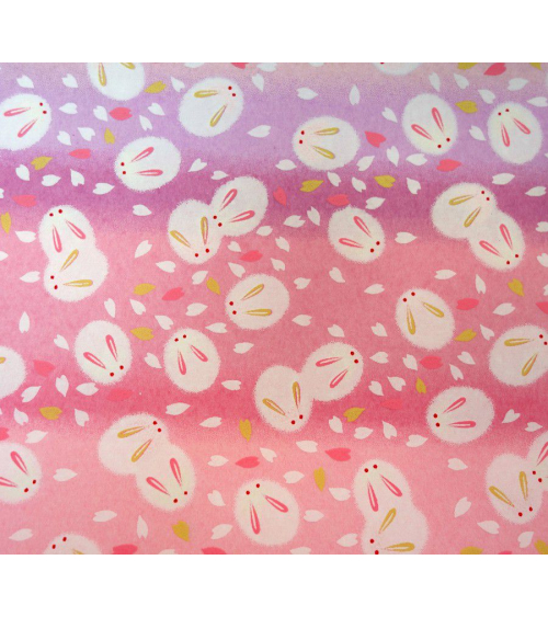 Papel japonés chiyogami tiernos conejitos sobre fondo en rosas 