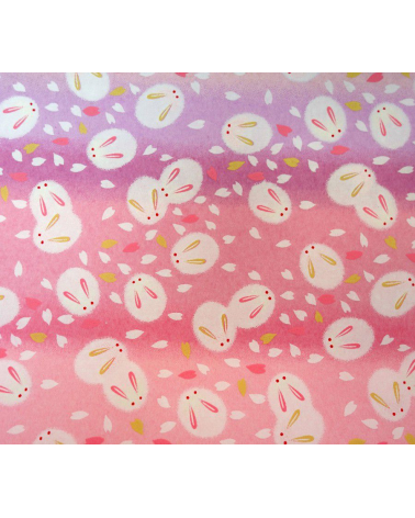 Papel japonés chiyogami tiernos conejitos sobre fondo en rosas 