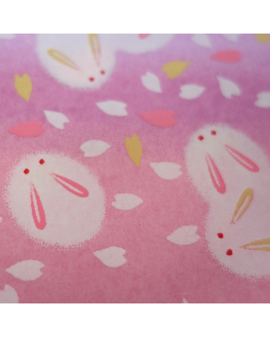 Papel japonés chiyogami tiernos conejitos sobre fondo en rosas 