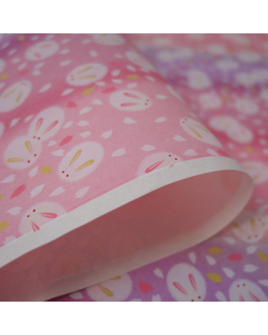 Papel japonés chiyogami tiernos conejitos sobre fondo en rosas 