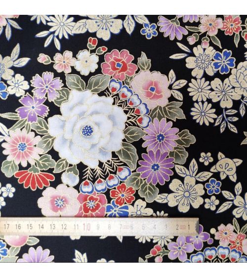 Japanese fabric with multicolor and golden flowers on black.