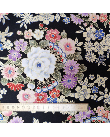 Japanese fabric with multicolor and golden flowers on black.