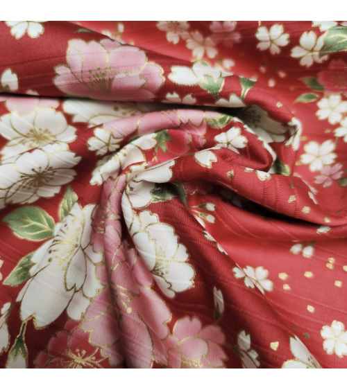 Japanese cotton satin slub fabric "Hanafubuki" in red.