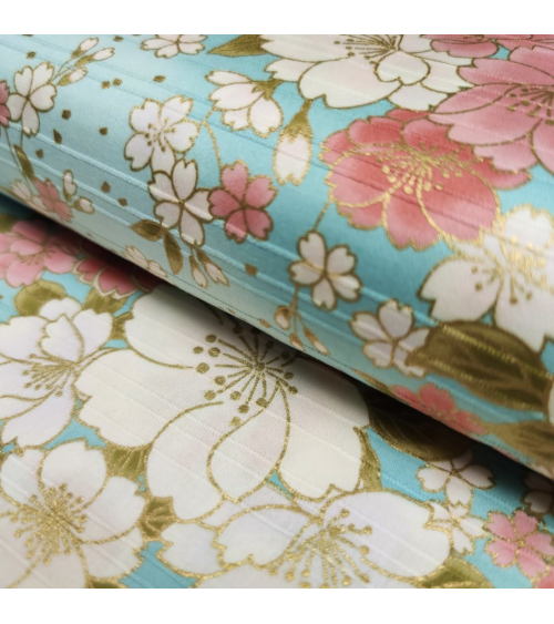 Japanese cotton satin slub fabric "Hanafubuki" in light blue.