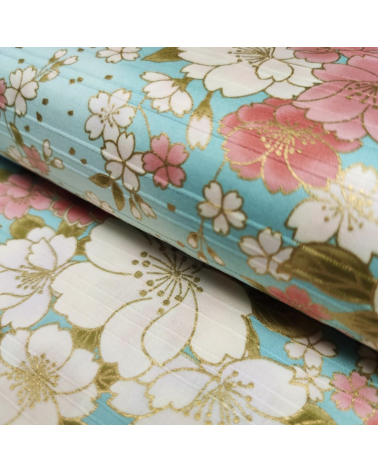 Japanese cotton satin slub fabric "Hanafubuki" in light blue.
