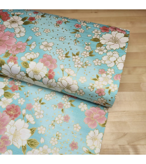 Tela japonesa en Satin de algodón "Hanafubuki" (Lluvia de pétalos) en azul claro.