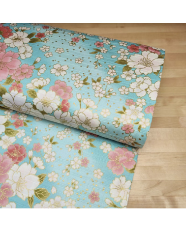 Tela japonesa en Satin de algodón "Hanafubuki" (Lluvia de pétalos) en azul claro.