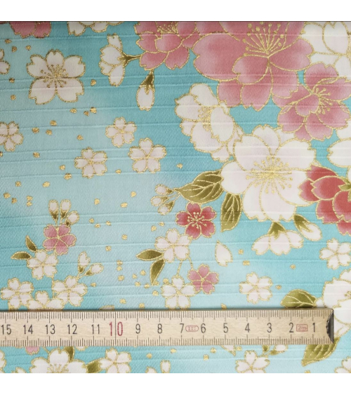 Tela japonesa en Satin de algodón "Hanafubuki" (Lluvia de pétalos) en azul claro.