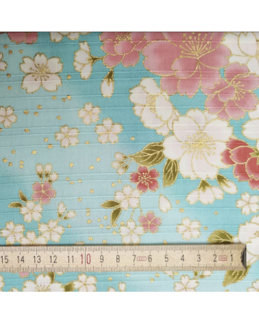 Japanese cotton satin slub fabric "Hanafubuki" in light blue.