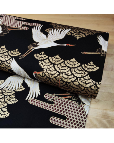 Japanese fabric. Flying Cranes and Clouds over black.