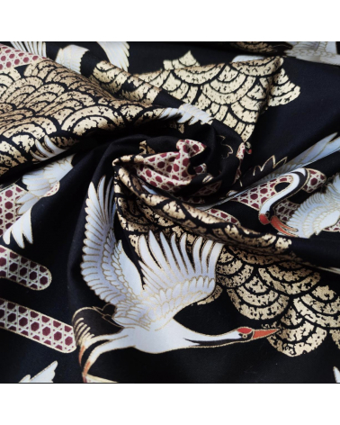 Japanese fabric. Flying Cranes and Clouds over black.