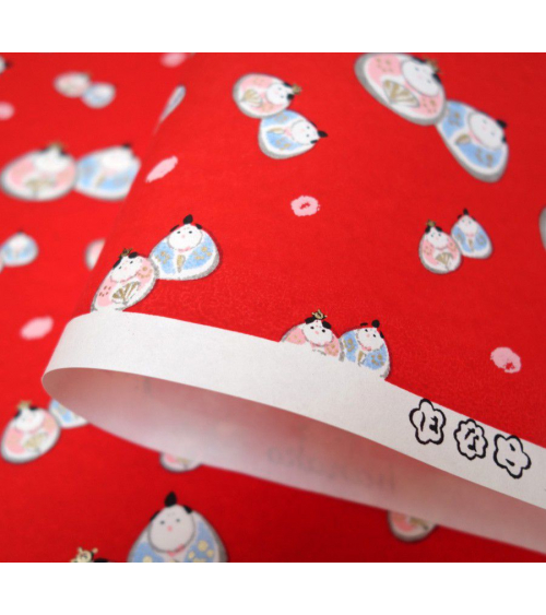 Papel japonés chiyogami hinamatsuri emperador y emperatriz sobre fondo rojo