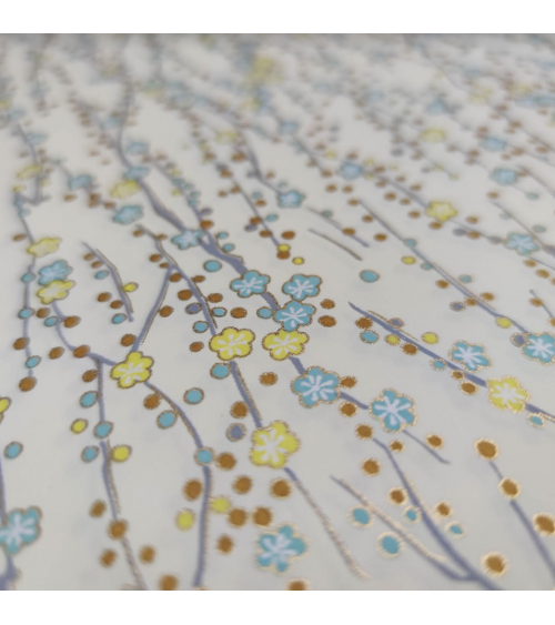 Chiyogami paper of yellow and mint flowers over vanilla yellow