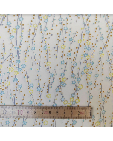 Chiyogami paper of yellow and mint flowers over vanilla yellow
