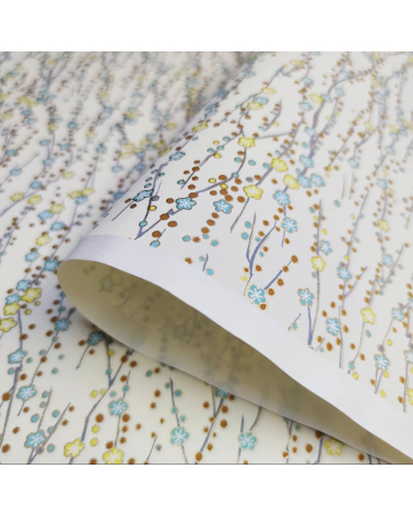 Chiyogami paper of yellow and mint flowers over vanilla yellow
