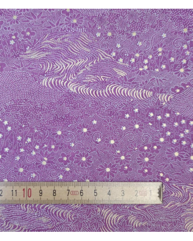 Chiyogami motivos tradicionales sobre fondo magenta.