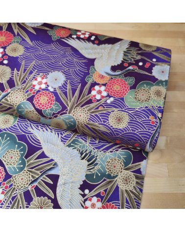 Tela japonesa de algodón de grullas en violeta con detalles en oro