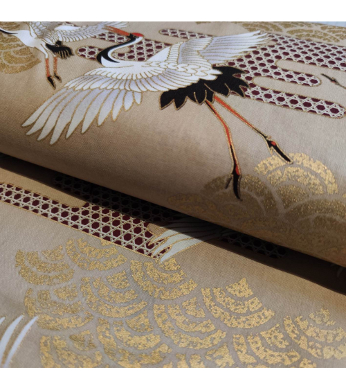 Japanese fabric. Flying Cranes and Clouds over tan.
