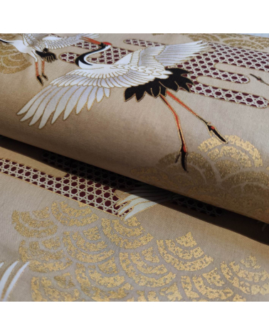 Japanese fabric. Flying Cranes and Clouds over tan.