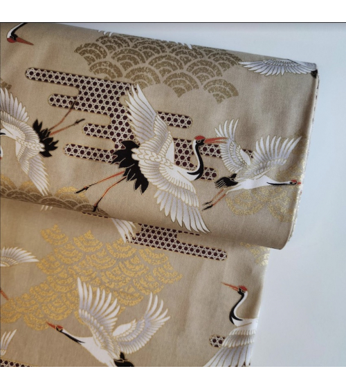 Japanese fabric. Flying Cranes and Clouds over tan.