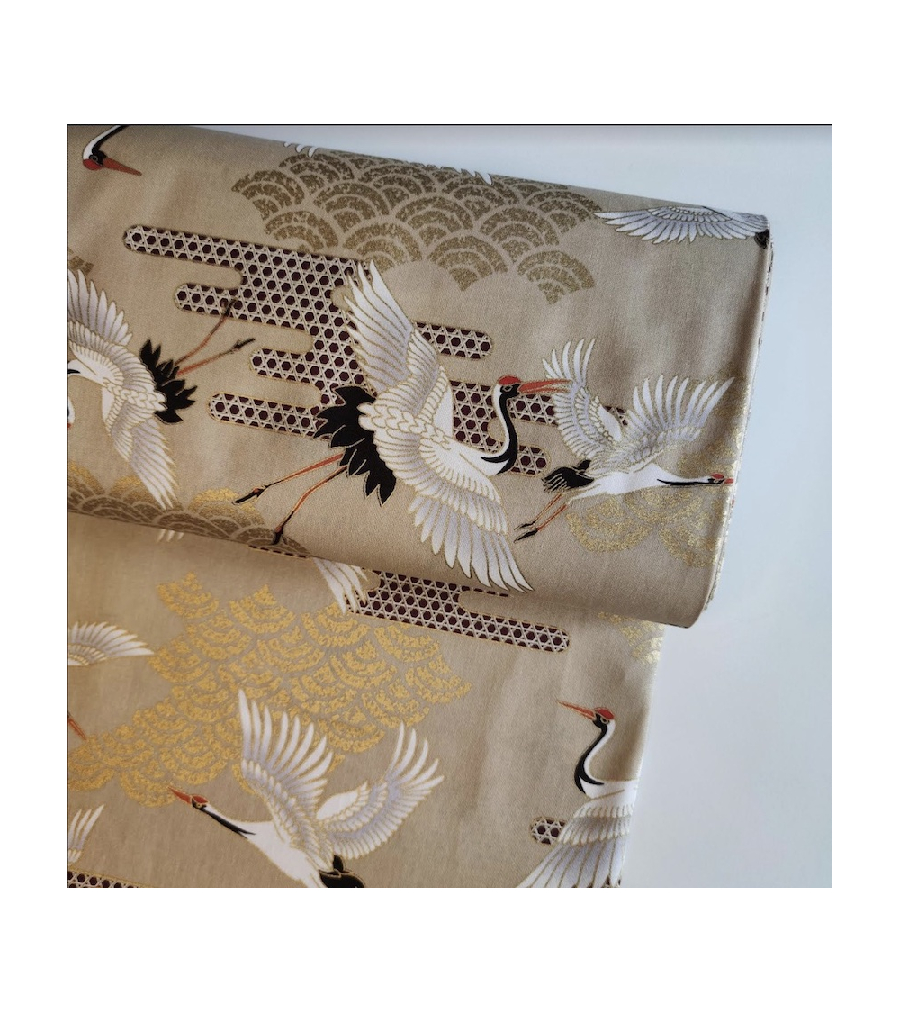 Japanese fabric. Flying Cranes and Clouds over tan.
