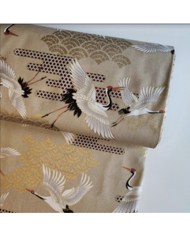 Japanese fabric. Flying Cranes and Clouds over tan.