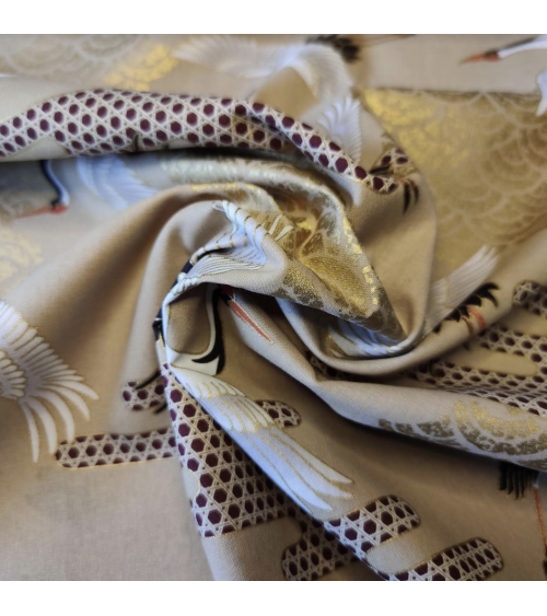 Japanese fabric. Flying Cranes and Clouds over tan.