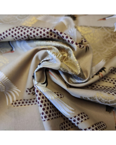 Japanese fabric. Flying Cranes and Clouds over tan.