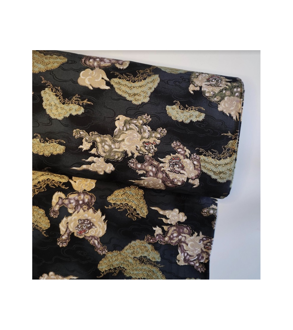 Japanese cotton fabric 'Sishi to matsu' in black.
