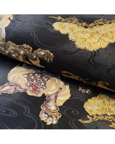 Japanese cotton fabric 'Sishi to matsu' in black.