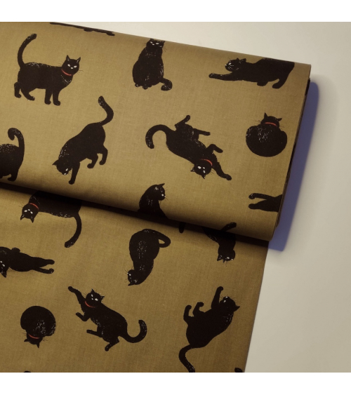 Japanese Fabric 'Cats' over kaki green background.